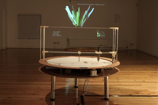 A Conversation Between Trees in Rufford Park - the climate machine with a projected visualisation of data captured in an oak tree in Sherwood Forest