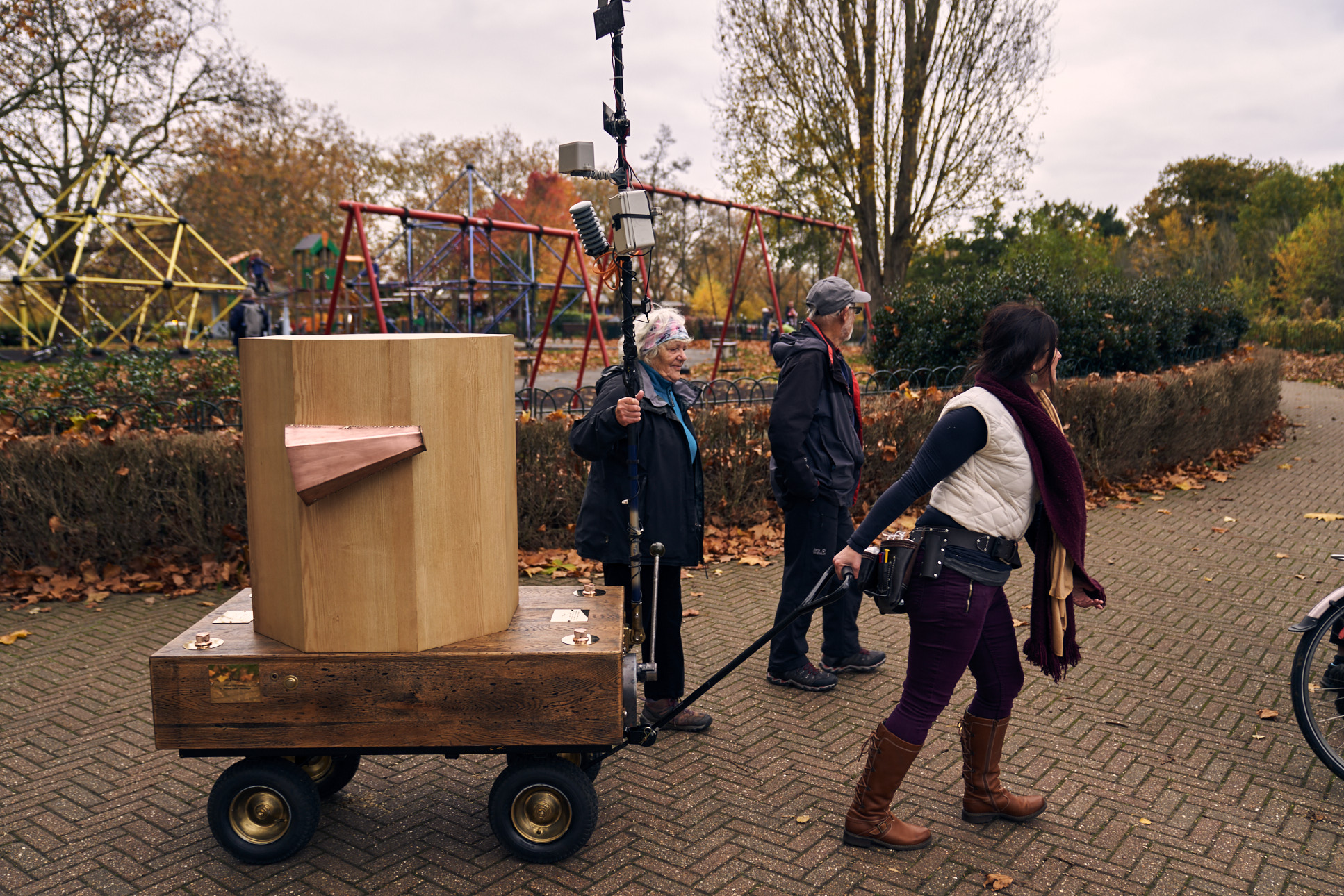 Rachel pulling the Future Machine artwork with other people through Finsbury Park, 2021